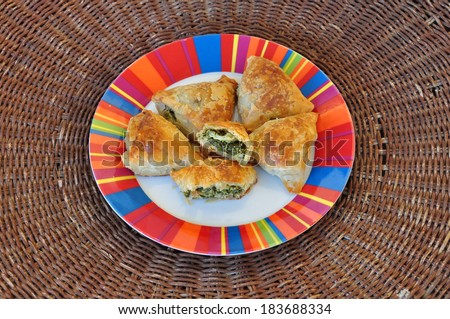 Spanakopita spinach pie with feta cheese and crispy filo dough. Greek food.