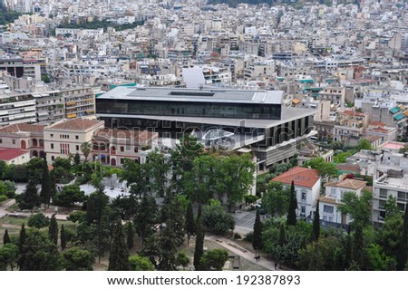 ATHENS, GREECE - MAY 6, 2014: Acropolis museum and panoramic view of downtown Athens, Greece.