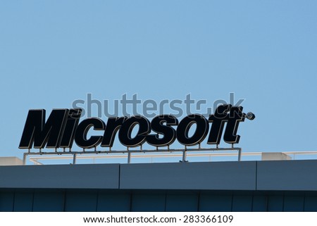 ATHENS, GREECE - APRIL 17, 2015: Microsoft office building detail of sign with logo against blue sky.
