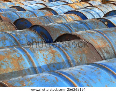 The used old blue oil tank.