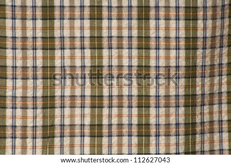Close-up of a beige squared fabric