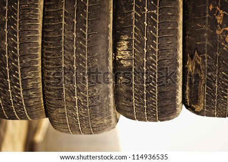 Close-up of four car tires