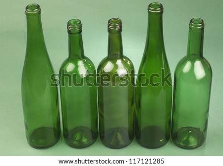 Close-up of empty wine bottles