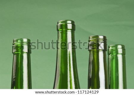 Bottle necks of empty wine bottles