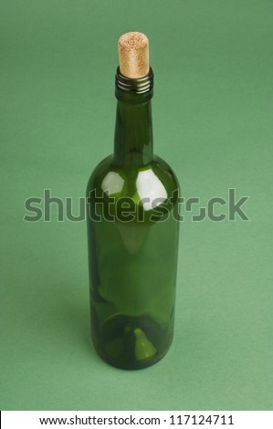 Close-up of an empty wine bottle with cork