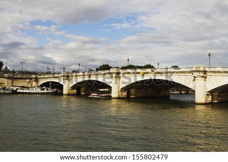 Arch bridge across the river, Seine River, Paris, France