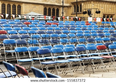 Rows of chairs in courtyard