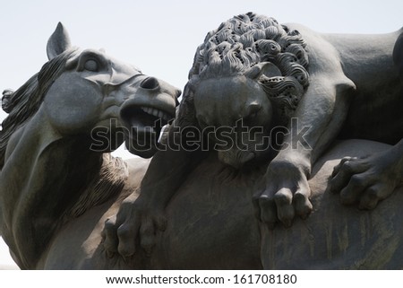 Sculpture depicting animals hunting, Chhatarpur Temple, New Delhi, India