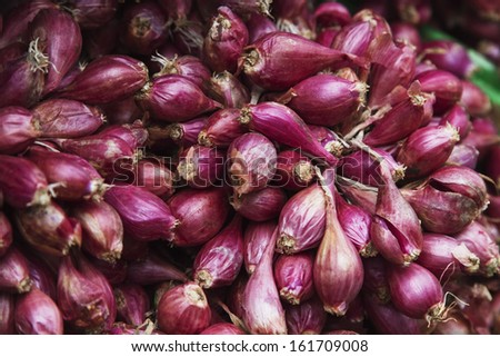 Heap of onions at a market stall, Republic of Ireland