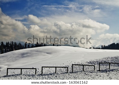 Clouds over a snow covered landscape, Kashmir, Jammu and Kashmir, India