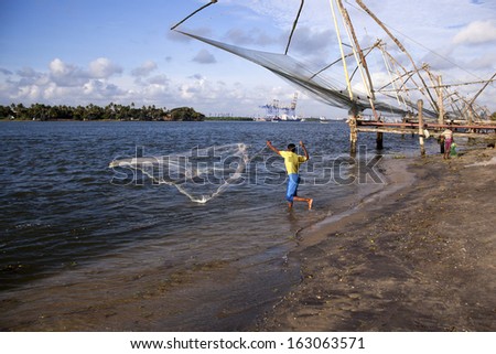 Fisherman fishing in the sea, Cochin, Kerala, India