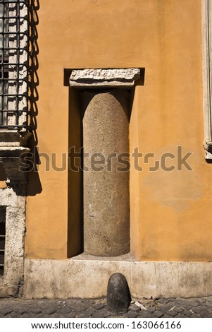 Old ruins of columns of a temple, Temple Of Apollo Sosianus, Rome, Rome Province, Italy