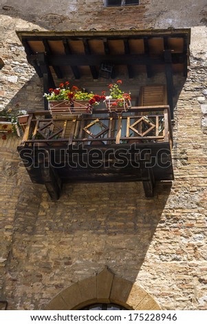 Low angle view of window box at a balcony, San Gimignano, Siena, Siena Province, Tuscany, Italy