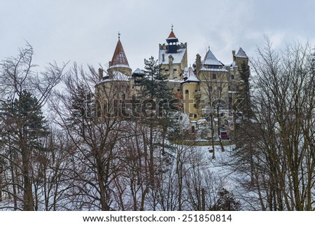 Bran Castle back view during winter season , also known as castle of count vampire Dracula.