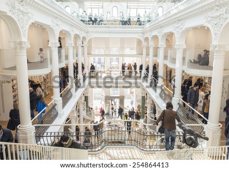 BUCHAREST, ROMANIA - FEBRUARY 22, 2015: People buying books from Carturesti, the newly opened mall library in downtown of Bucharest