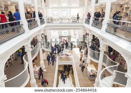 BUCHAREST, ROMANIA - FEBRUARY 22, 2015: People buying books from Carturesti, the newly opened mall library in downtown of Bucharest