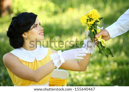 girl give flowers