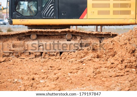 construction area with dirt and heavy equipment