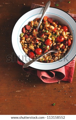 Beans with Sausages, Tomatoes and Sweet Pepper in plate