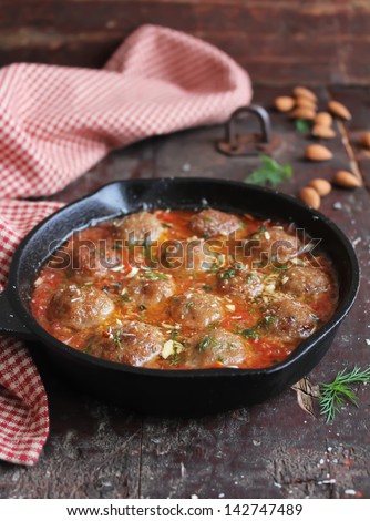 Moroccan Meatballs With Tomato Sauce, Spices, Almond Nuts And Fresh Dill In A Pan Ready To Serve