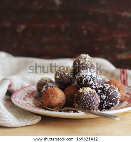 Homemade Chocolate Truffles With Nuts, Coconut And Cocoa Powder