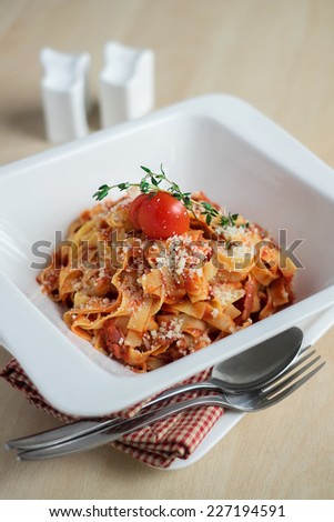 Cooked pasta bolognese in a plate