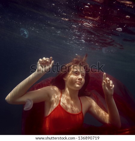 young girl underwater