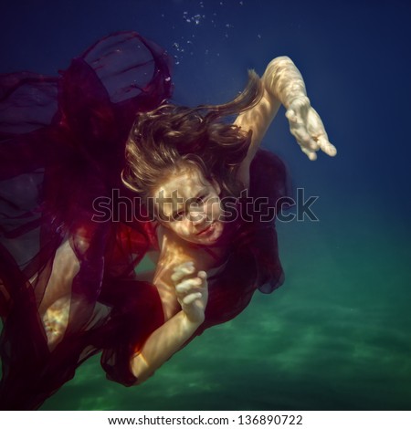 young girl underwater