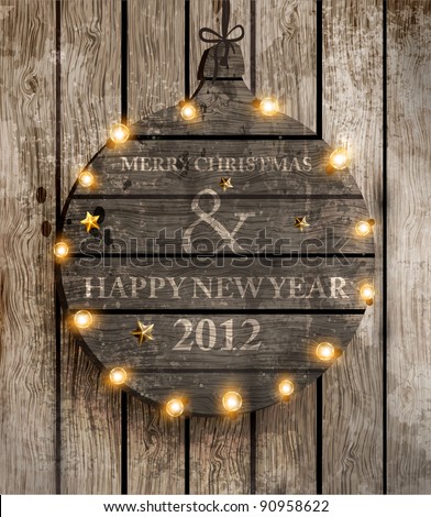 Vintage Christmas wood background with ball and garland Free place for Your text Vintage Christmas wood background with ball and garland Free place for Your text