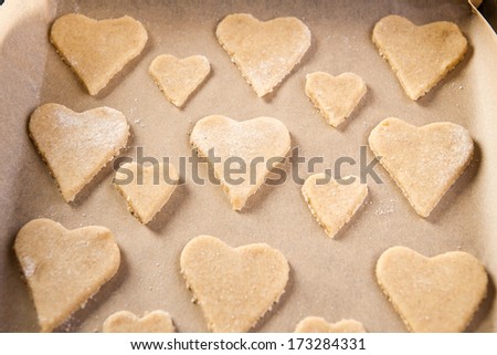 Heart shaped cookies in baking tin