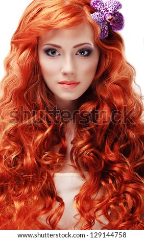 http://image.shutterstock.com/display_pic_with_logo/1106129/129144758/stock-photo-portrait-of-beautiful-red-haired-girl-with-curly-long-hair-with-a-flower-on-a-white-background-129144758.jpg