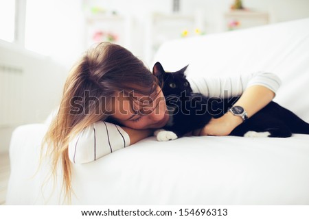 Beautiful Girl Sleeps With A Cat