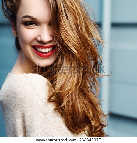 Portrait of a beautiful girl in a hat, smiling, lifestyle