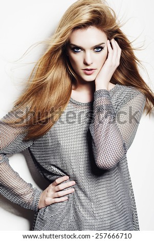 Portrait of a beautiful blonde woman in studio on white background, concept of beauty and health