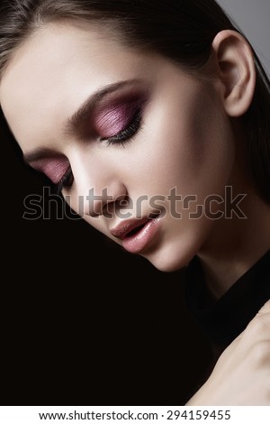 Portrait of a young cute girl in studio, face close up, concept of beauty and health