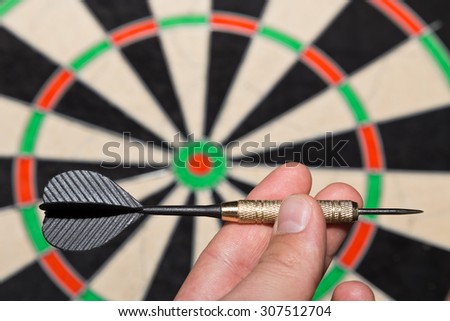 dart in hand