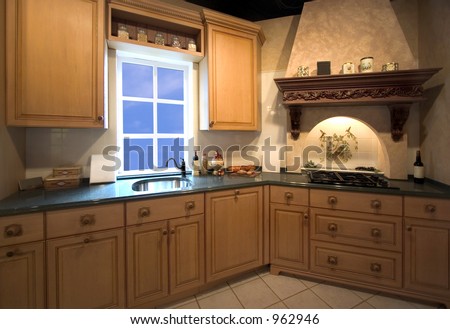 kitchen interior with tile work above stove and spectacular window