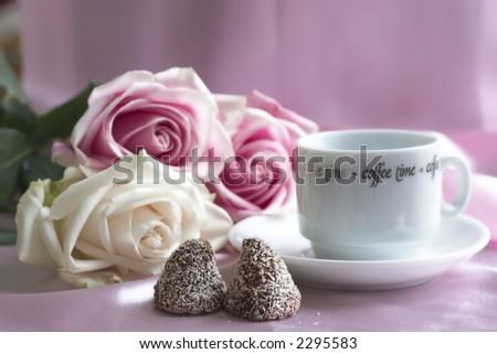 Valentine still life (roses ,candies, coffee in a morning light)