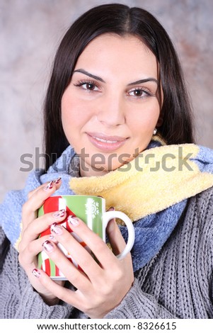 Girl in winter cloth with mug