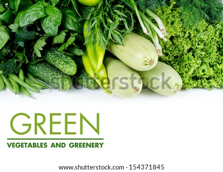 Fresh green vegetables on a white background.