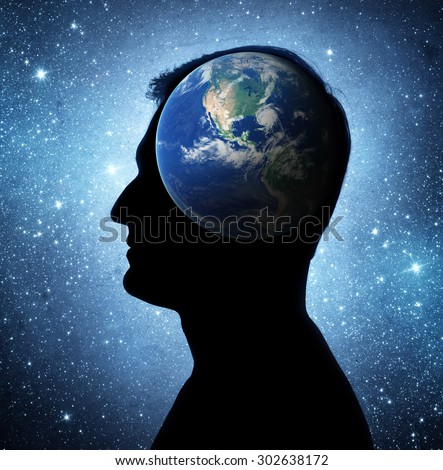The earth within. Silhouette of a man inside the universe. The concept on scientific and philosophical topics. Elements of this image furnished by NASA.