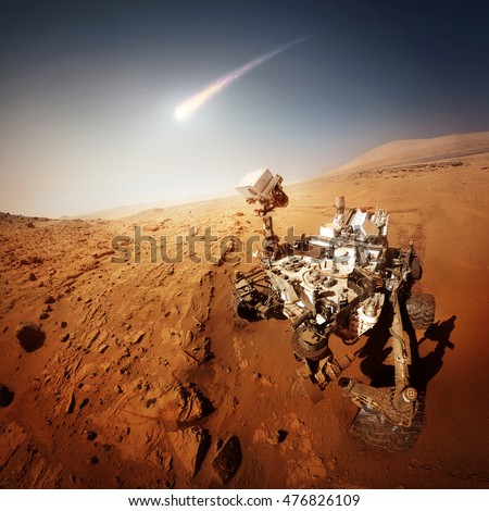 Mars Rover explores the red planet. Elements of this image furnished by NASA.