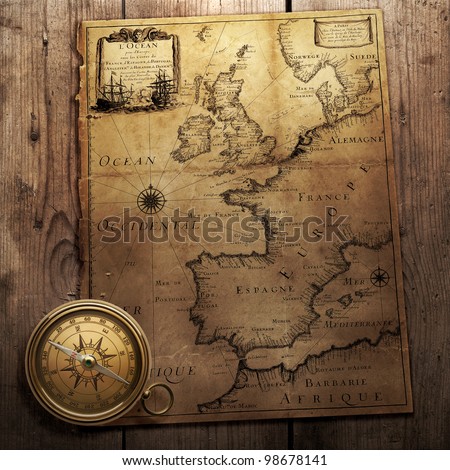 old compass on vintage map (France, Spain, England, Portugal, Holland, Denmark  author Pierre Du Val (1618-1683) Paris. France 1666 )