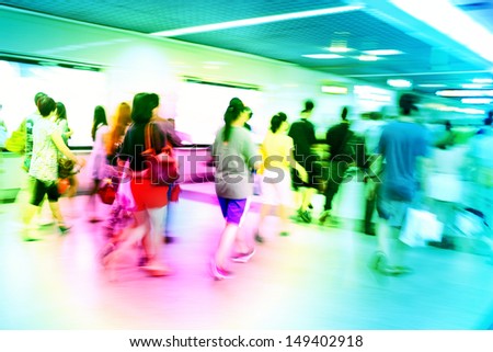 people walking in business city in metro station