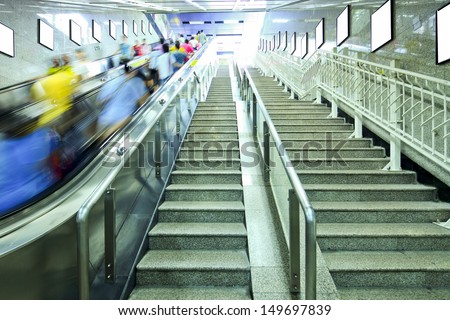 business people on Elevators in metro station