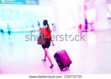 passengers dragged baggage walking on the way at airport for check in