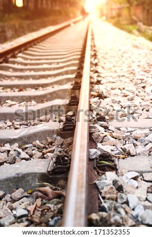 train fast run on railway track in sunny day