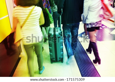business people walking at metro station or airport with baggage and pack