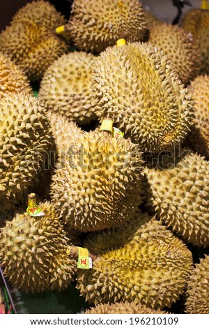 Large jack fruit and golden pillow durian with large spikes at market