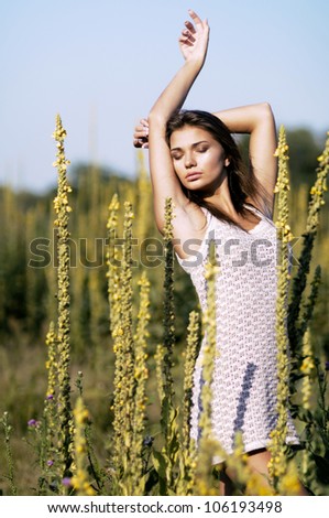 young sexy woman  in a wet dress,series of portrait outdoors